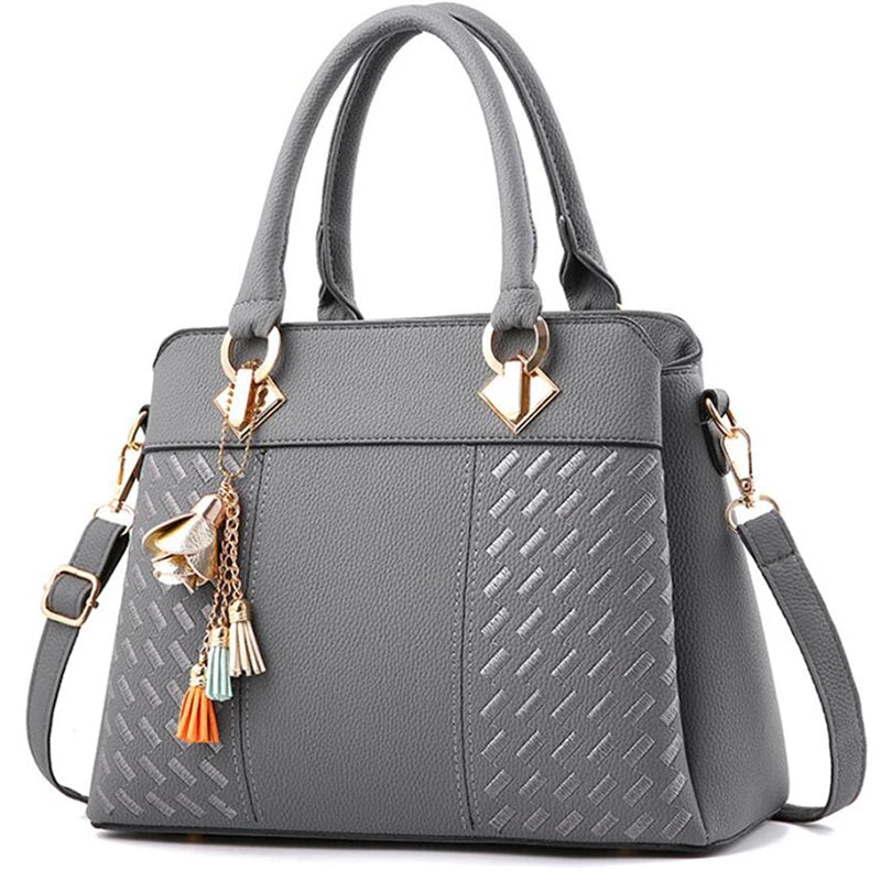 Gusure Embroidered Tote – Elegant, Spacious & Tassel-Accented
