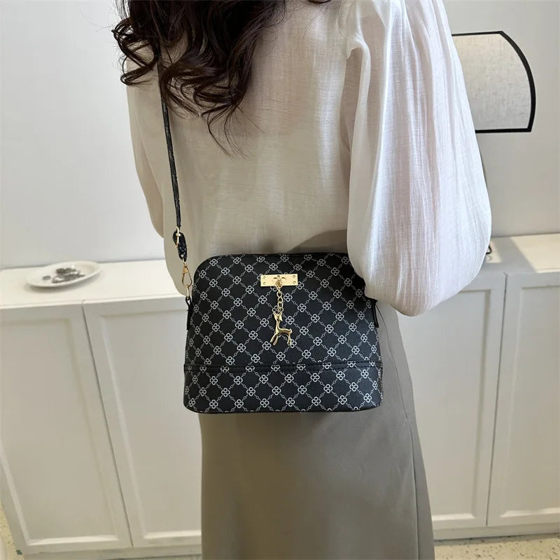 Leather Shell Crossbody – Women’s Shoulder Handbag with Deer Pendant