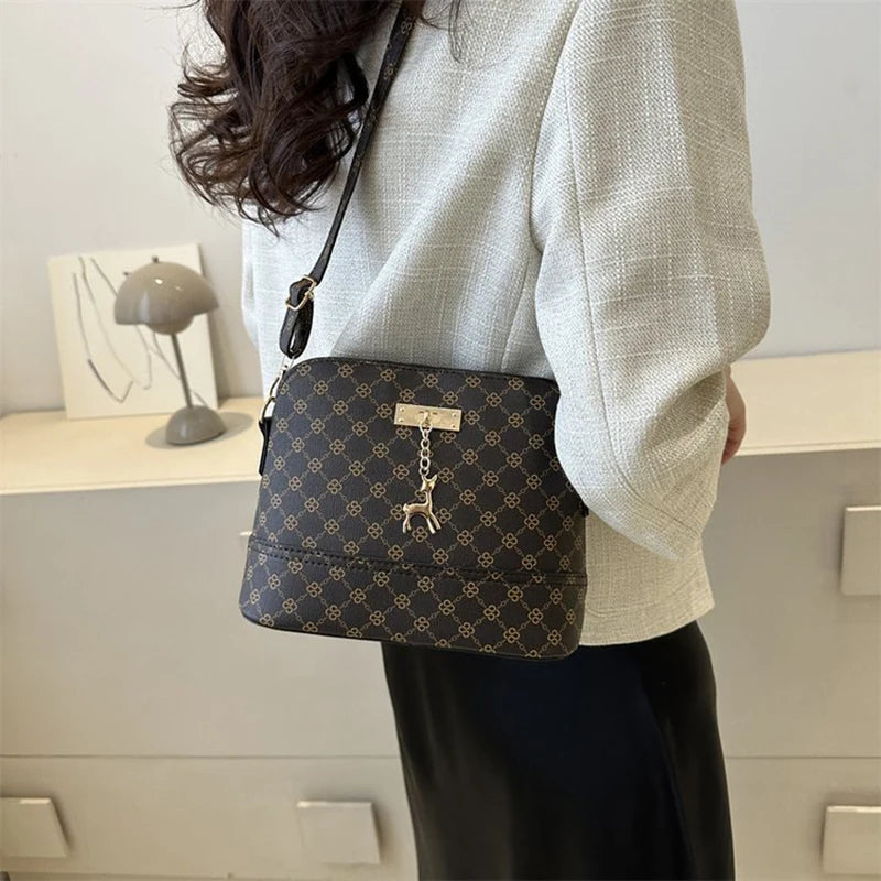 Leather Shell Crossbody – Women’s Shoulder Handbag with Deer Pendant