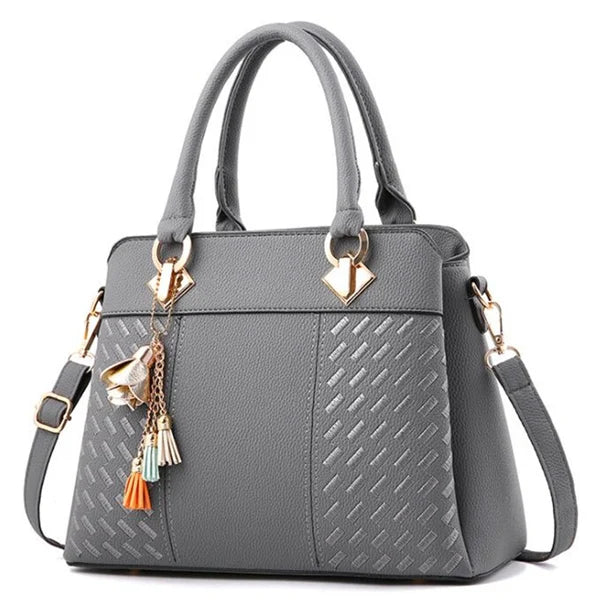 Gusure Embroidered Tote – Elegant, Spacious & Tassel-Accented