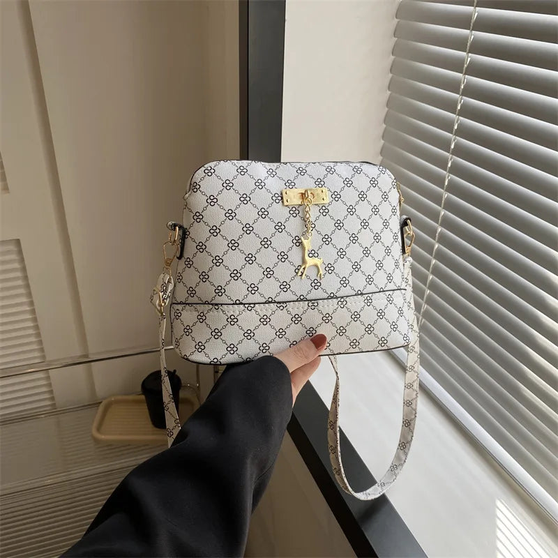 Leather Shell Crossbody – Women’s Shoulder Handbag with Deer Pendant