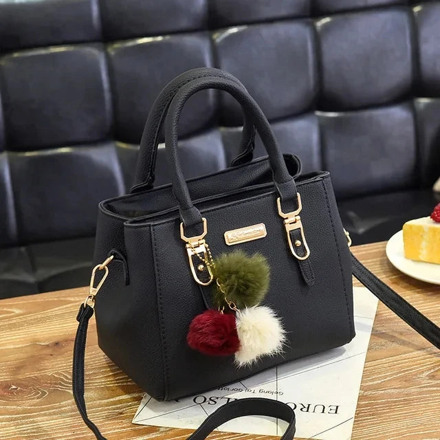 Gusure Embroidered Tote – Elegant, Spacious & Tassel-Accented