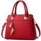 Gusure Embroidered Tote – Elegant, Spacious & Tassel-Accented