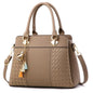 Gusure Embroidered Tote – Elegant, Spacious & Tassel-Accented